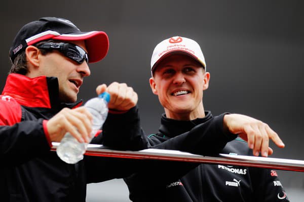 Timo Glock (vľavo) na spoločnej fotografii s Michaelom Schumacherom.