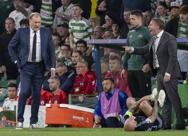 Na snímke zľava tréner ŠK Slovan Bratislava Vladimír Weiss st., na trávniku leží kapitán ŠK Slovan Bratislava Vladimír Weiss ml. a tréner Celtic FC Brendan Rodgers.