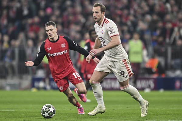 Harry Kane a Florian Wirtz v súboji