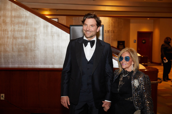 BRADLEY COOPER AND GLORIA CAMPANO during red carpet arrivals for the 94th Academy Awards